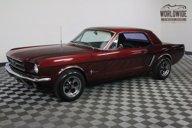 Red 1965 Ford Mustang with Black interior
