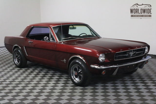 Red 1965 Ford Mustang with Black interior