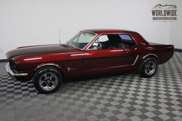 Red 1965 Ford Mustang with Black interior