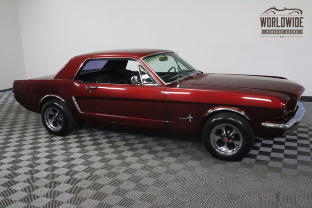 Red 1965 Ford Mustang with Black interior