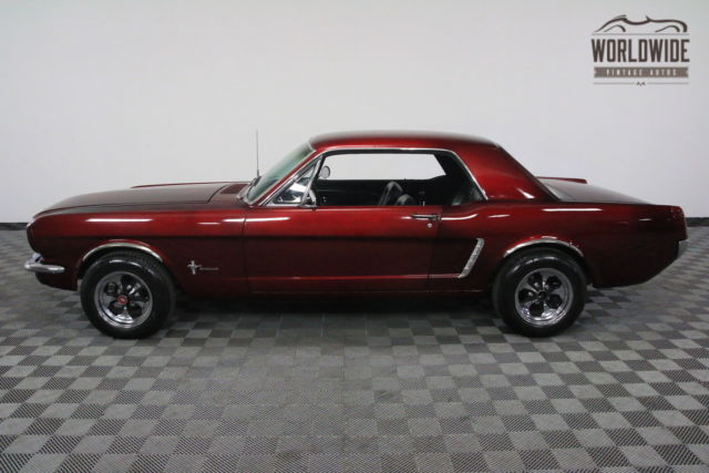 Red 1965 Ford Mustang with Black interior