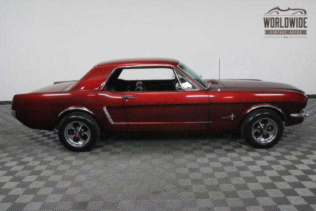 Red 1965 Ford Mustang with Black interior