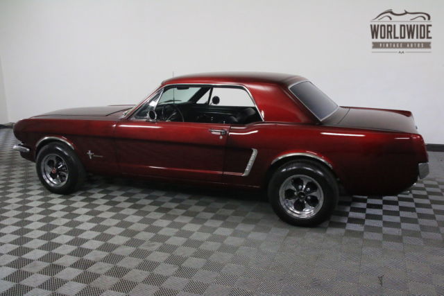 Red 1965 Ford Mustang with Black interior
