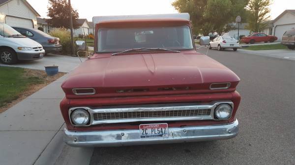 Red 1966 Chevrolet C-10 Crew Cab Pickup with Red and blue interior