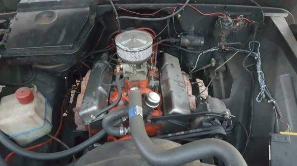 Red 1966 Chevrolet C-10 Crew Cab Pickup with Red and blue interior
