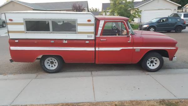Red 1966 Chevrolet C-10 Crew Cab Pickup with Red and blue interior