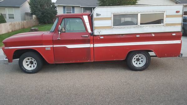 Red 1966 Chevrolet C-10 Crew Cab Pickup with Red and blue interior