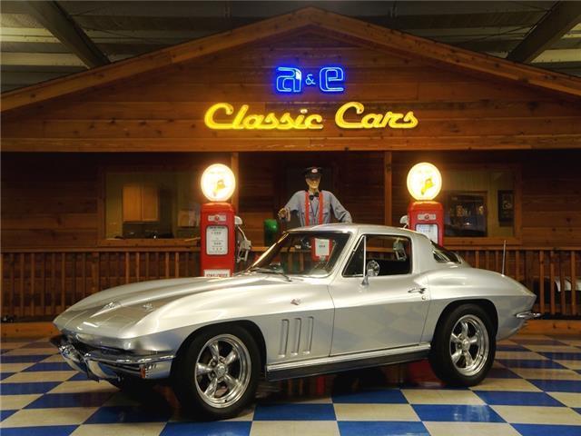 Silver 1966 Chevrolet Corvette -- with Black interior