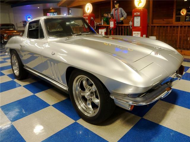 Silver 1966 Chevrolet Corvette -- with Black interior