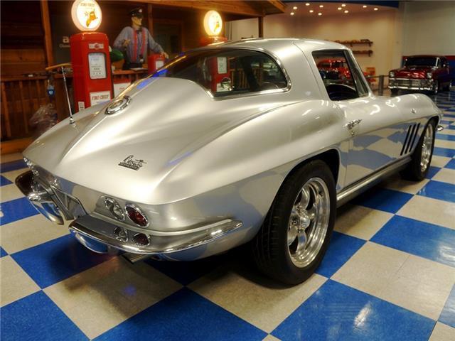 Silver 1966 Chevrolet Corvette -- with Black interior