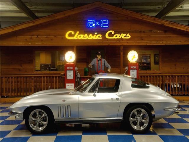 Silver 1966 Chevrolet Corvette -- with Black interior