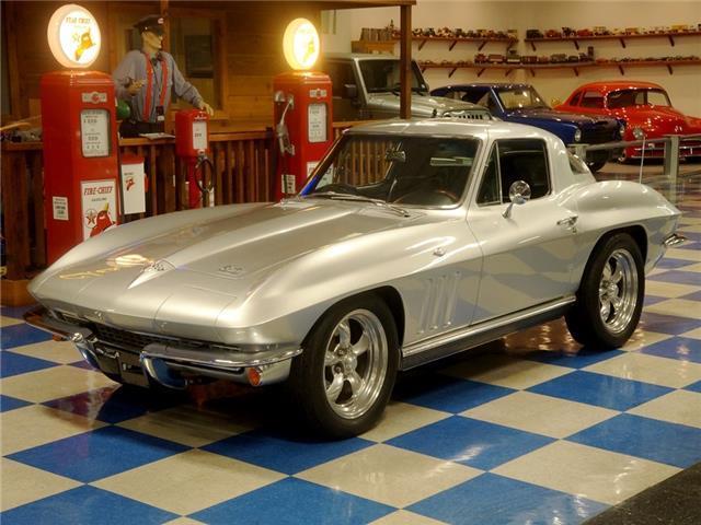 Silver 1966 Chevrolet Corvette -- with Black interior