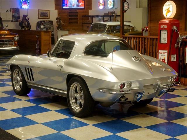 Silver 1966 Chevrolet Corvette -- with Black interior