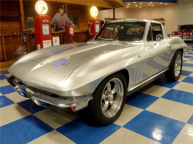 Silver 1966 Chevrolet Corvette -- with Black interior