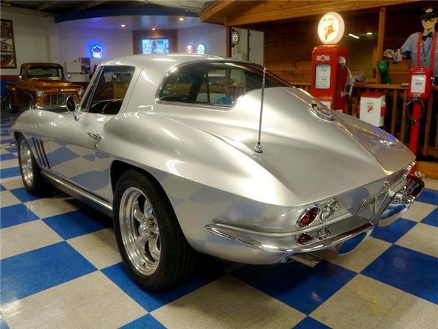Silver 1966 Chevrolet Corvette -- with Black interior