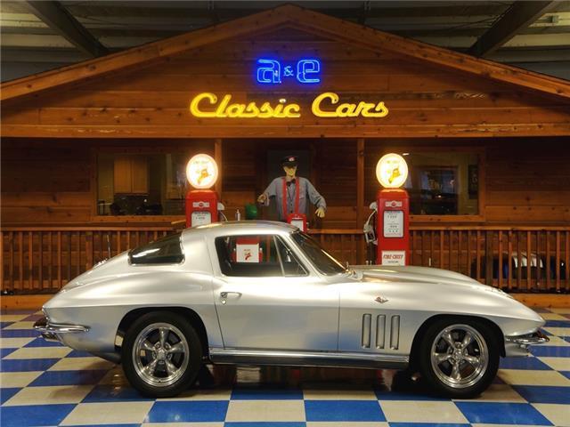 Silver 1966 Chevrolet Corvette -- with Black interior