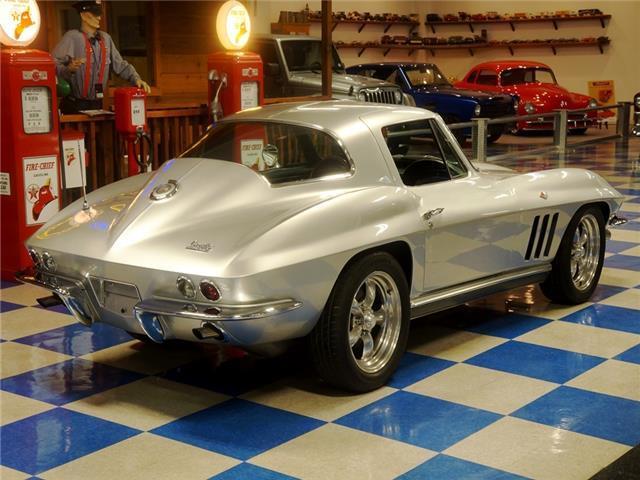 Silver 1966 Chevrolet Corvette -- with Black interior