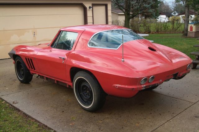 Rally Red 1966 Chevrolet Corvette coupe with Black interior