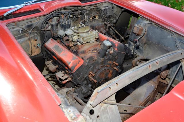 Rally Red 1966 Chevrolet Corvette coupe with Black interior