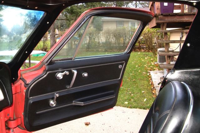 Rally Red 1966 Chevrolet Corvette coupe with Black interior