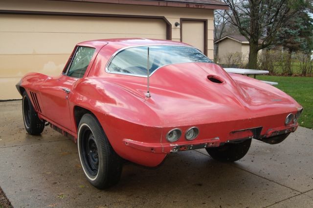 Rally Red 1966 Chevrolet Corvette coupe with Black interior