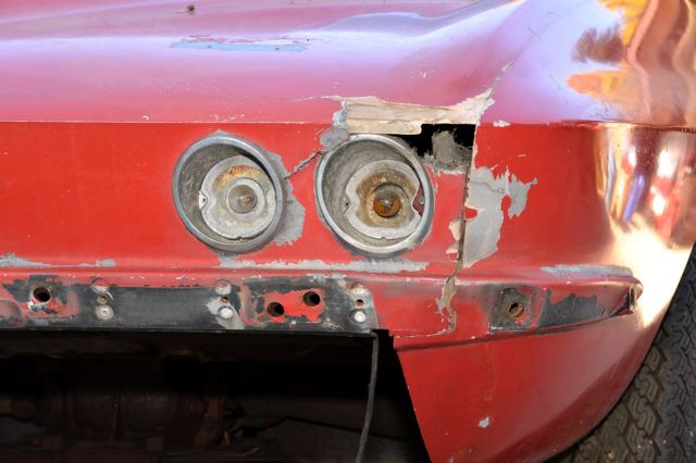 Rally Red 1966 Chevrolet Corvette coupe with Black interior