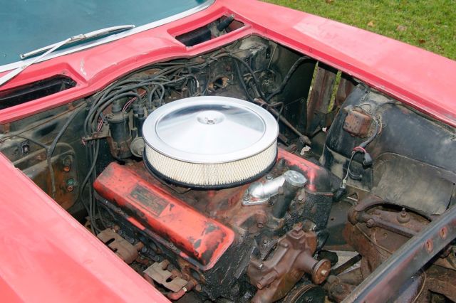 Rally Red 1966 Chevrolet Corvette coupe with Black interior