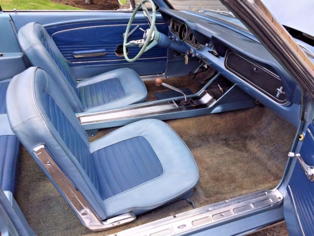 blue 1966 Ford Mustang with blue interior