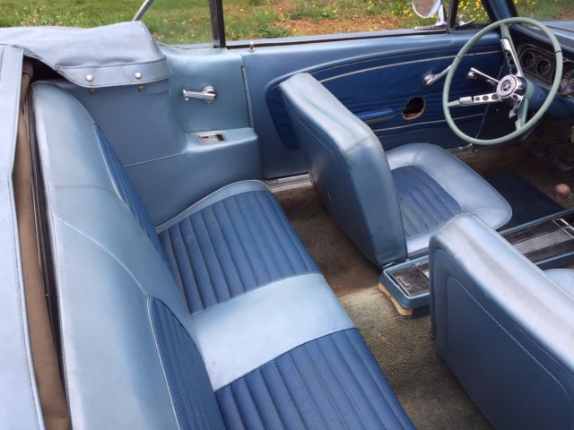 blue 1966 Ford Mustang with blue interior