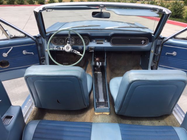 blue 1966 Ford Mustang with blue interior