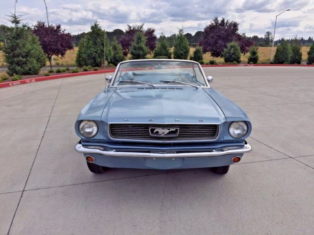 blue 1966 Ford Mustang with blue interior