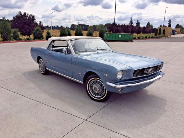 blue 1966 Ford Mustang with blue interior