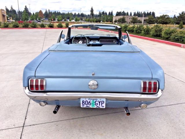 blue 1966 Ford Mustang with blue interior