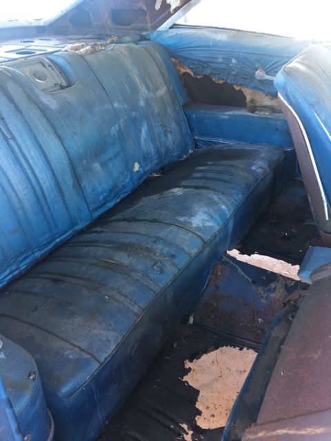 Rust brown gold 1966 Chevrolet Impala Coupe with Blue interior