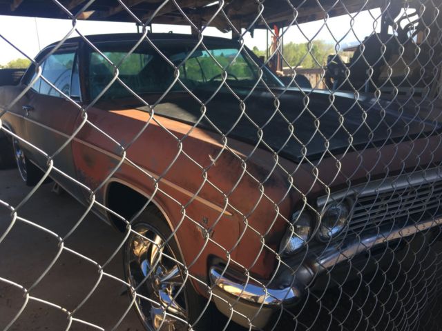 Rust brown gold 1966 Chevrolet Impala Coupe with Blue interior