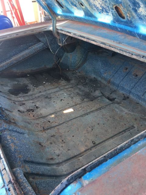 Rust brown gold 1966 Chevrolet Impala Coupe with Blue interior