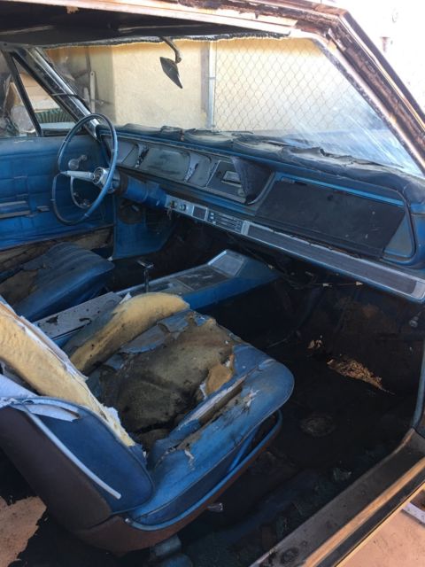 Rust brown gold 1966 Chevrolet Impala Coupe with Blue interior