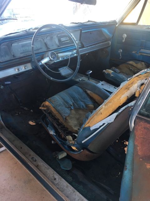 Rust brown gold 1966 Chevrolet Impala Coupe with Blue interior