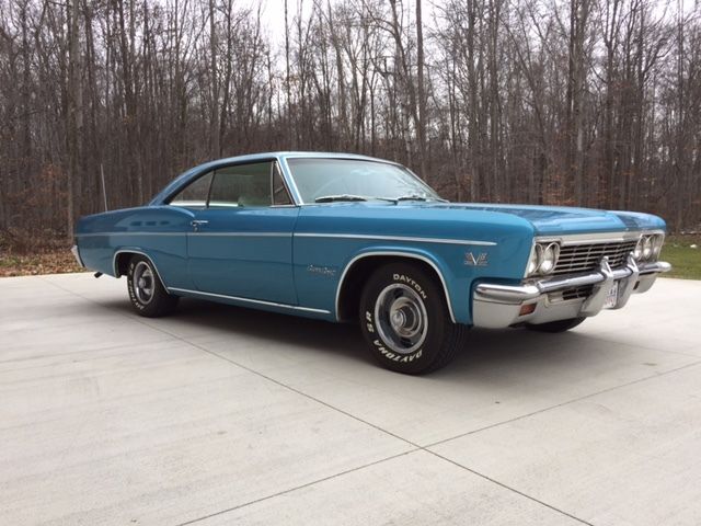 Marina Blue 1966 Chevrolet Impala Coupe with Ivory interior