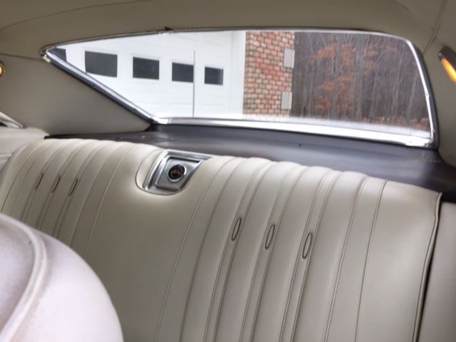 Marina Blue 1966 Chevrolet Impala Coupe with Ivory interior