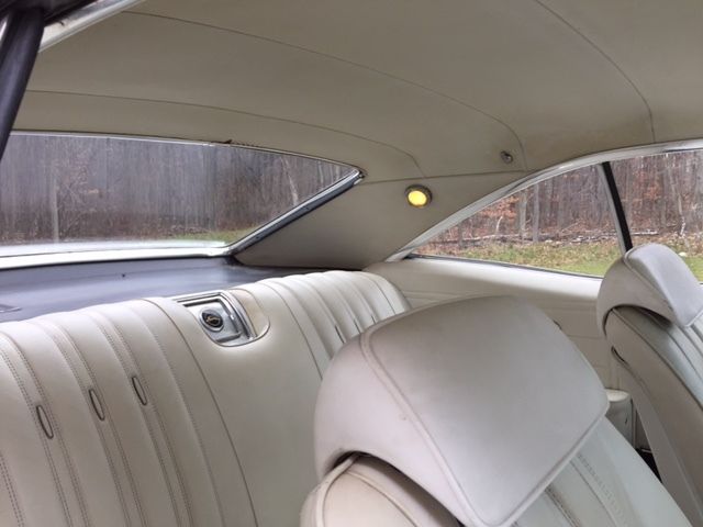 Marina Blue 1966 Chevrolet Impala Coupe with Ivory interior
