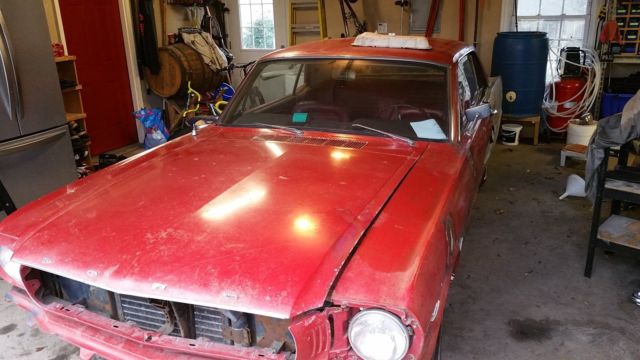 Red 1966 Ford Mustang Coupe with Red interior
