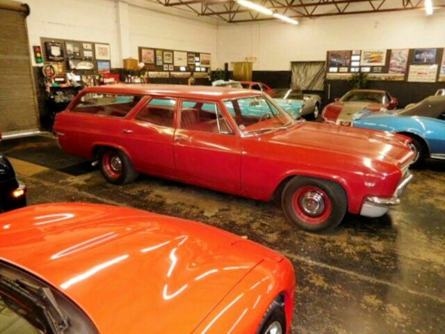 Red 1966 Chevrolet Impala Wagon with Red interior