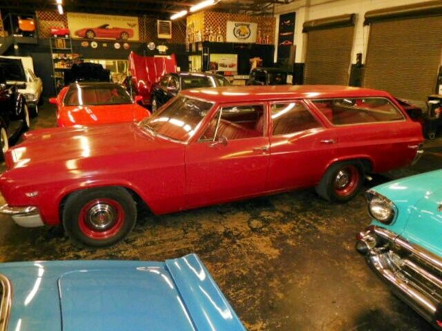 Red 1966 Chevrolet Impala Wagon with Red interior
