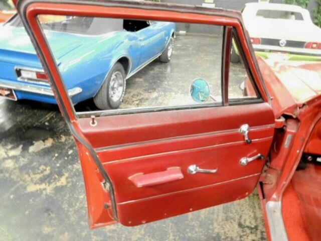 Red 1966 Chevrolet Impala Wagon with Red interior