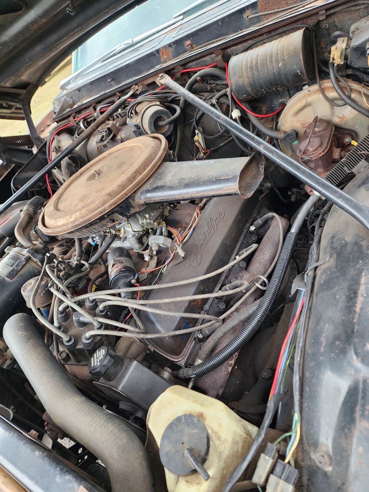 Black 1967 Cadillac DeVille Coupe with Burgundy interior