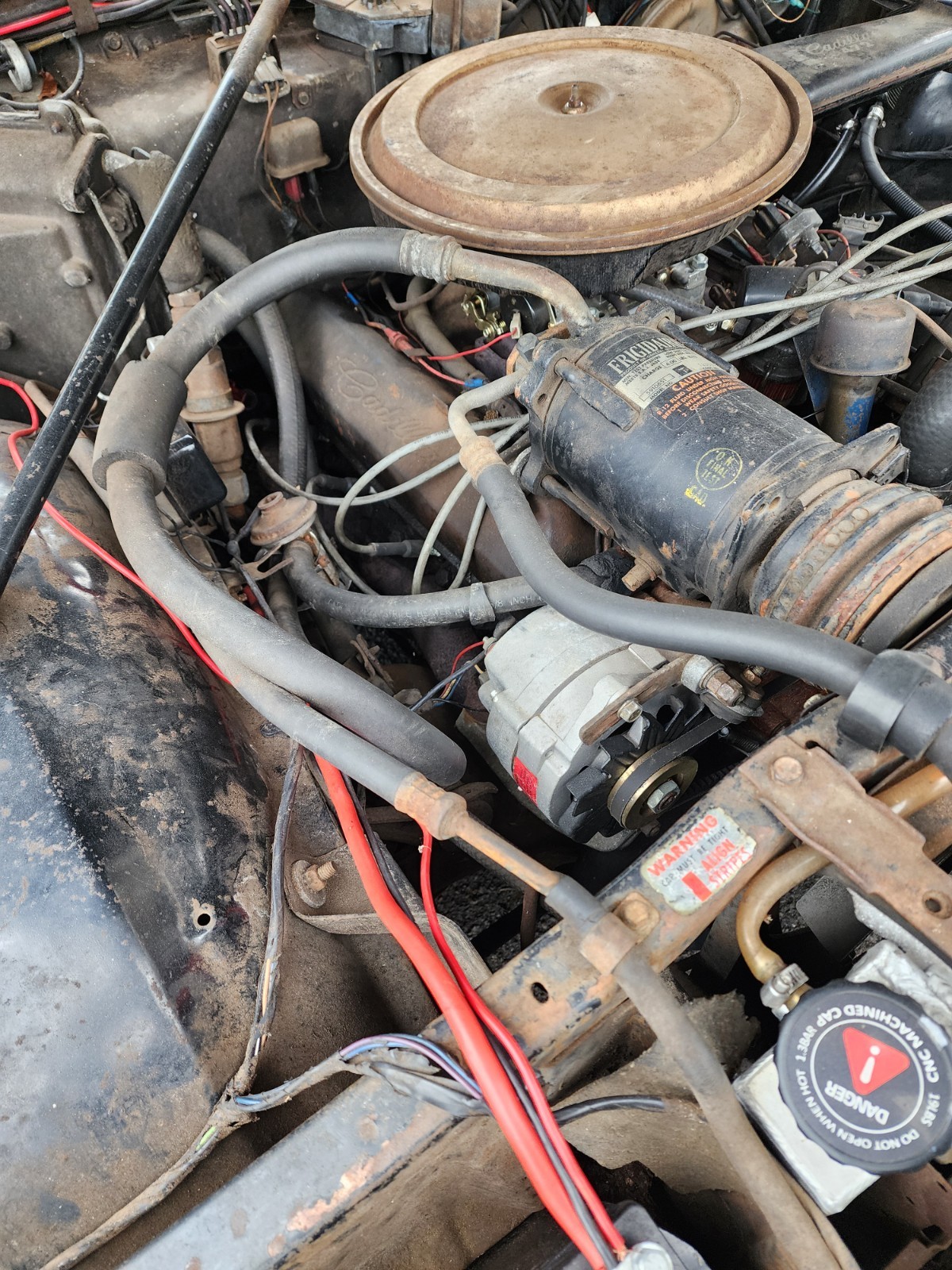 Black 1967 Cadillac DeVille Coupe with Burgundy interior