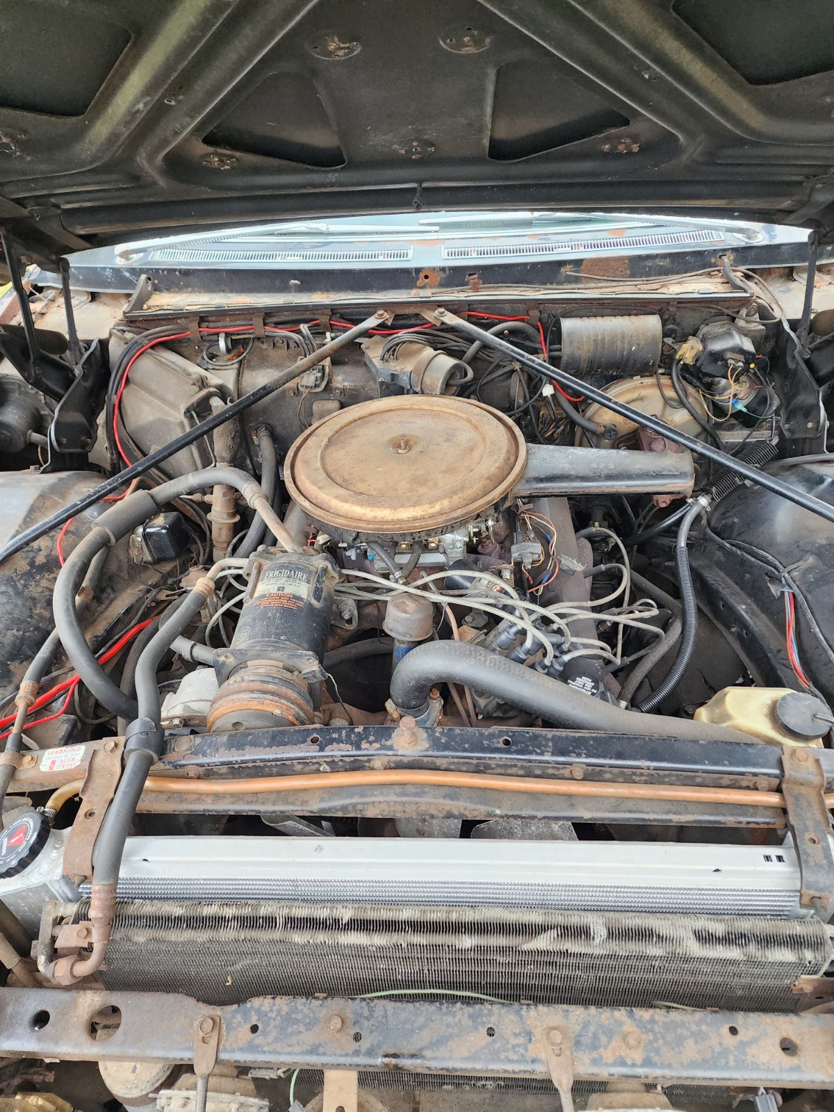 Black 1967 Cadillac DeVille Coupe with Burgundy interior