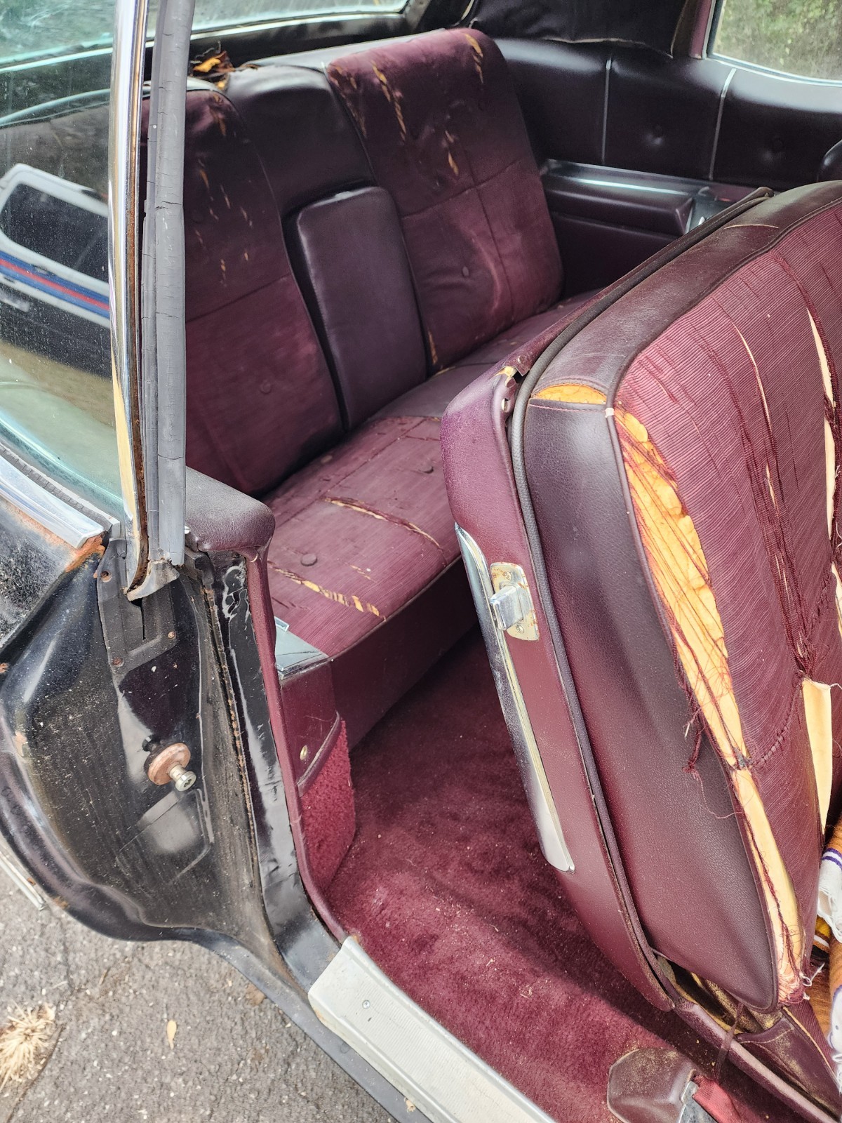 Black 1967 Cadillac DeVille Coupe with Burgundy interior