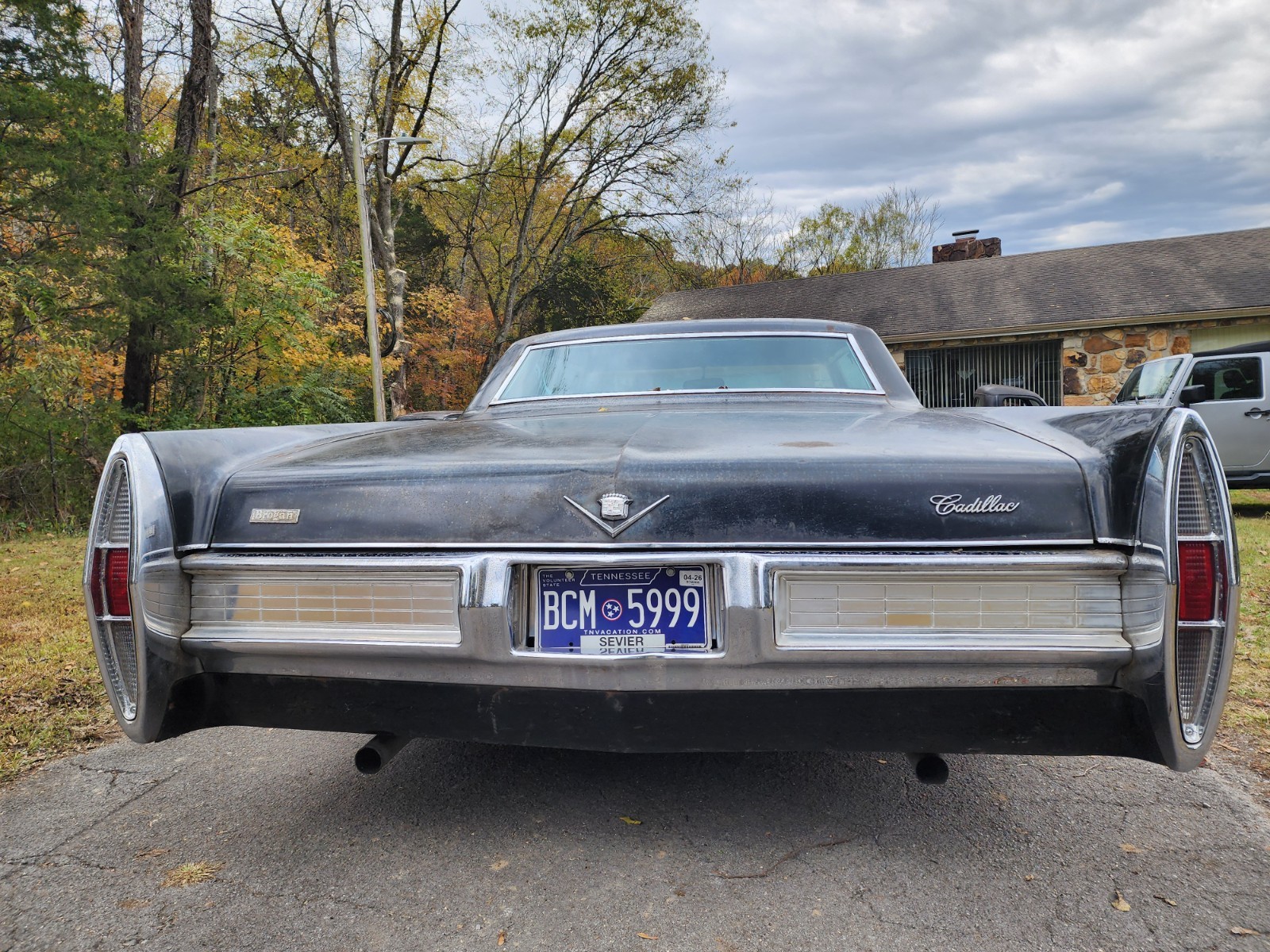 Black 1967 Cadillac DeVille Coupe with Burgundy interior